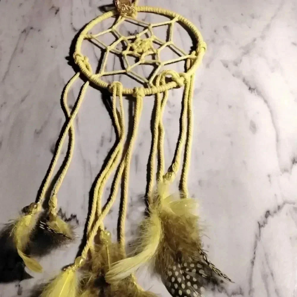 Lorena Espinoza Designs handmade yellow dream catcher with gemstone